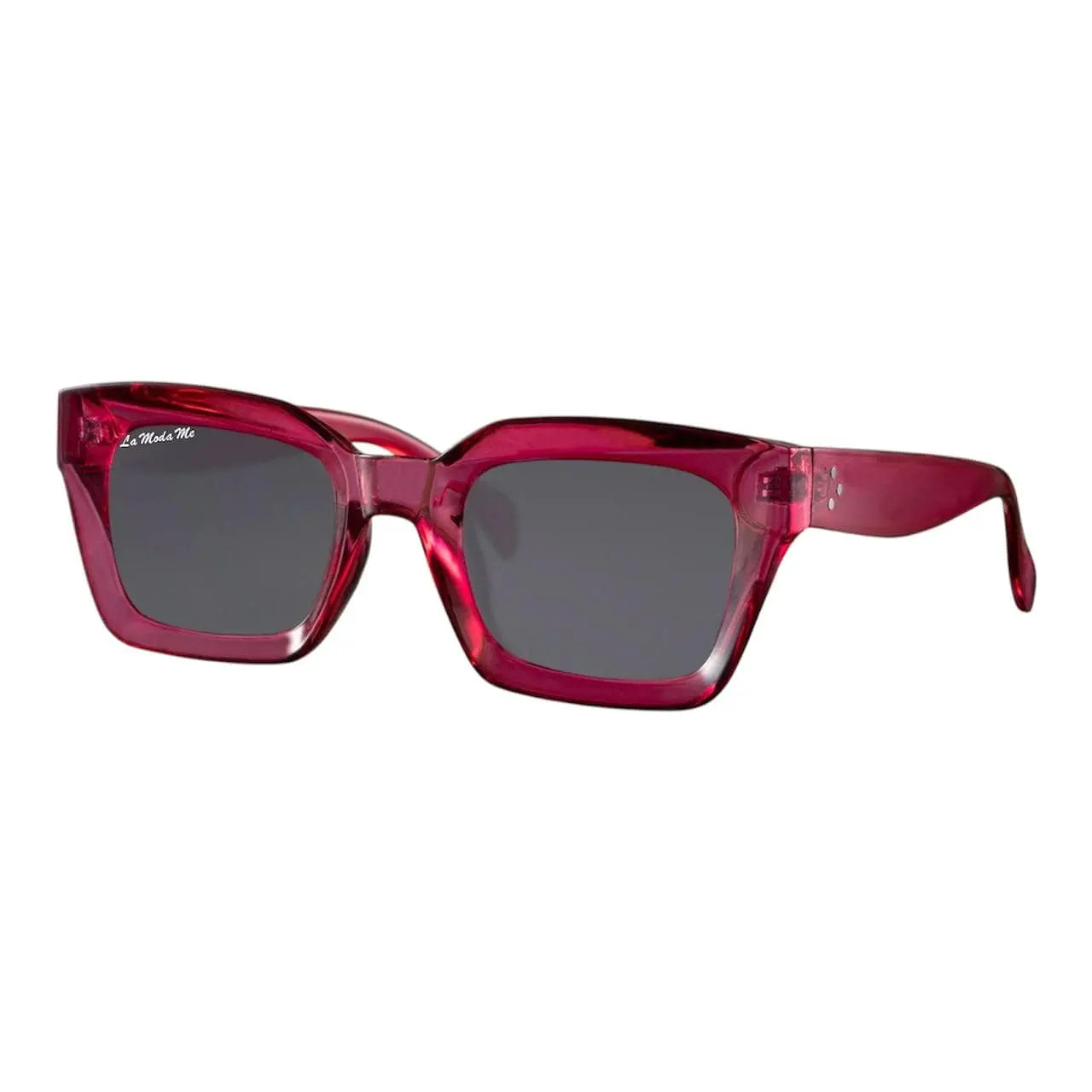 Luum sunglasses with translucent pink plastic square frames and dark tinted lenses.
